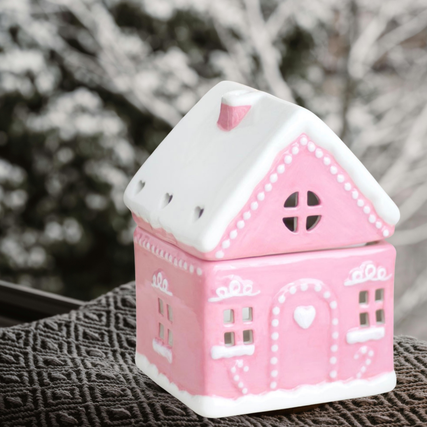 Roze geurenbrander in huisvorm voor waxmelts