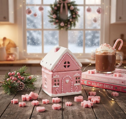 Roze waxmeltsbrander in huisvorm voor Kerst met witte details, geschikt voor het branden van waxmelts en als sfeervolle kerstdecoratie